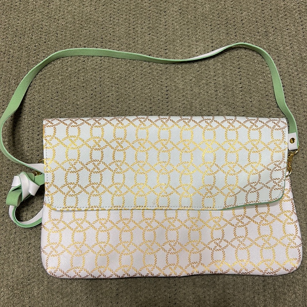 Top it off! Purse brand new no tags never used.